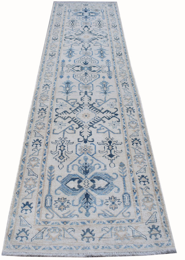 Authentic Hallway Runner Made in Afghanistan. Striking blue colours on a handknotted rug. Available online or in our Melbourne showroom