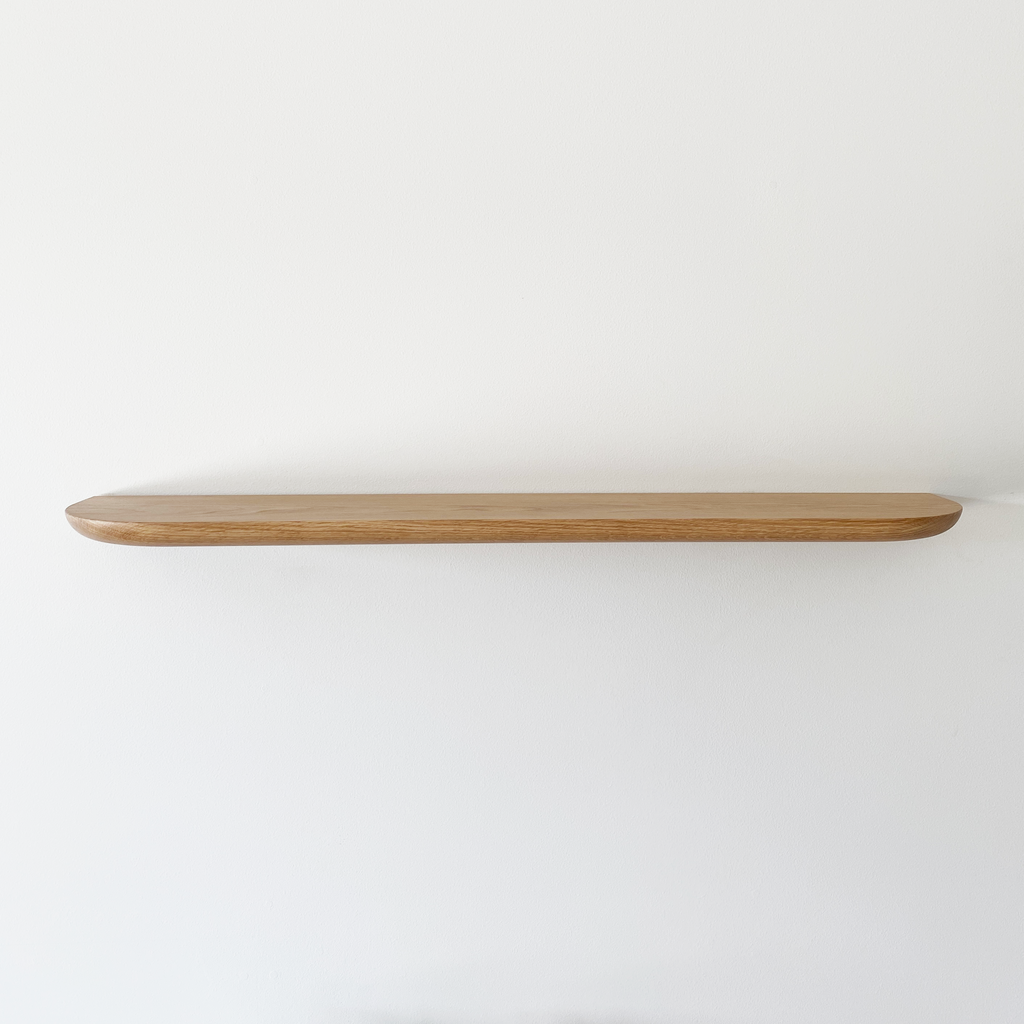 Solid American Oak Floating Timber Shelf made to order in custom sizes. Australian Made Round Corners and Curved Profile Shelf Detail.