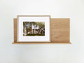 The Gallery Wall Shelf, Leaning shelf for art and photography with ledge in American Oak.  