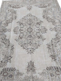 Vintage Handmade Turkish Rug with cream base and brown floral pattern. Dated from the 1960's. Traditional Vintage Turkish Rug available in Melbourne