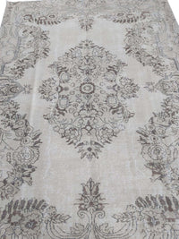 Vintage Handmade Turkish Rug with cream base and brown floral pattern. Dated from the 1960's. Traditional Vintage Turkish Rug available in Melbourne