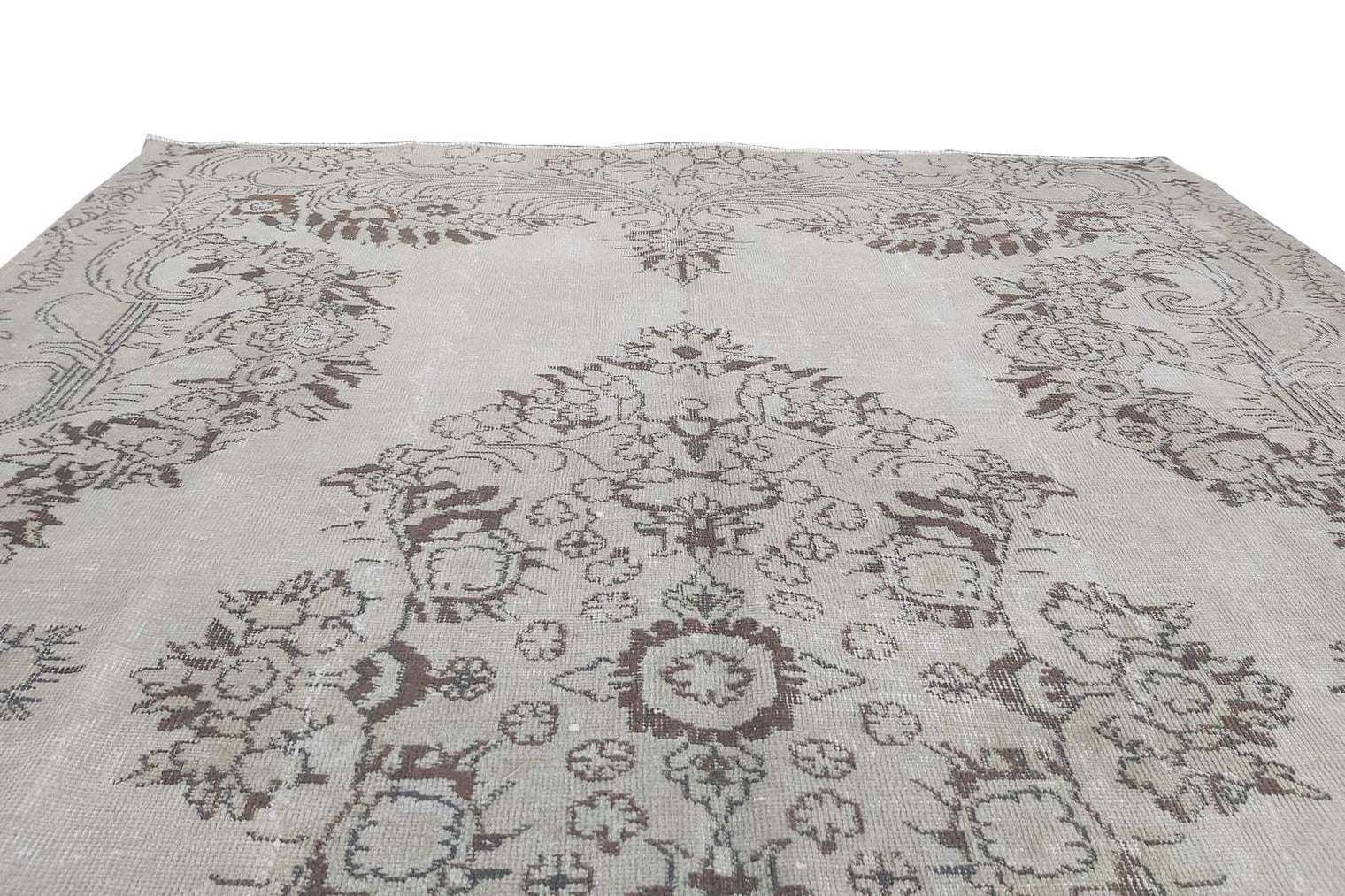 Vintage Handmade Turkish Rug with cream base and brown floral pattern. Dated from the 1960's. Traditional Vintage Turkish Rug available in Melbourne