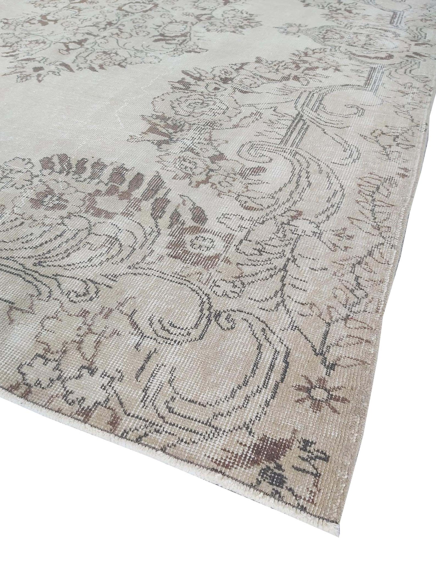 Vintage Handmade Turkish Rug with cream base and brown floral pattern. Dated from the 1960's. Traditional Vintage Turkish Rug available in Melbourne