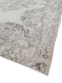 Vintage Handmade Turkish Rug with cream base and brown floral pattern. Dated from the 1960's. Traditional Vintage Turkish Rug available in Melbourne